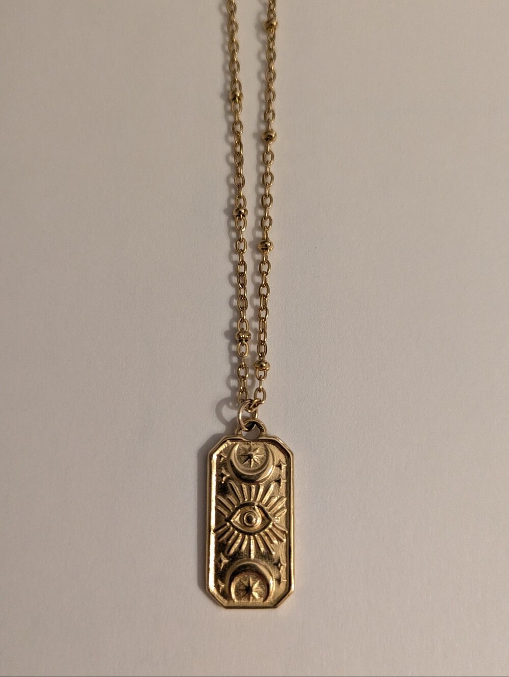 Gold-tone Celestial Evil Eye Pendant Necklace